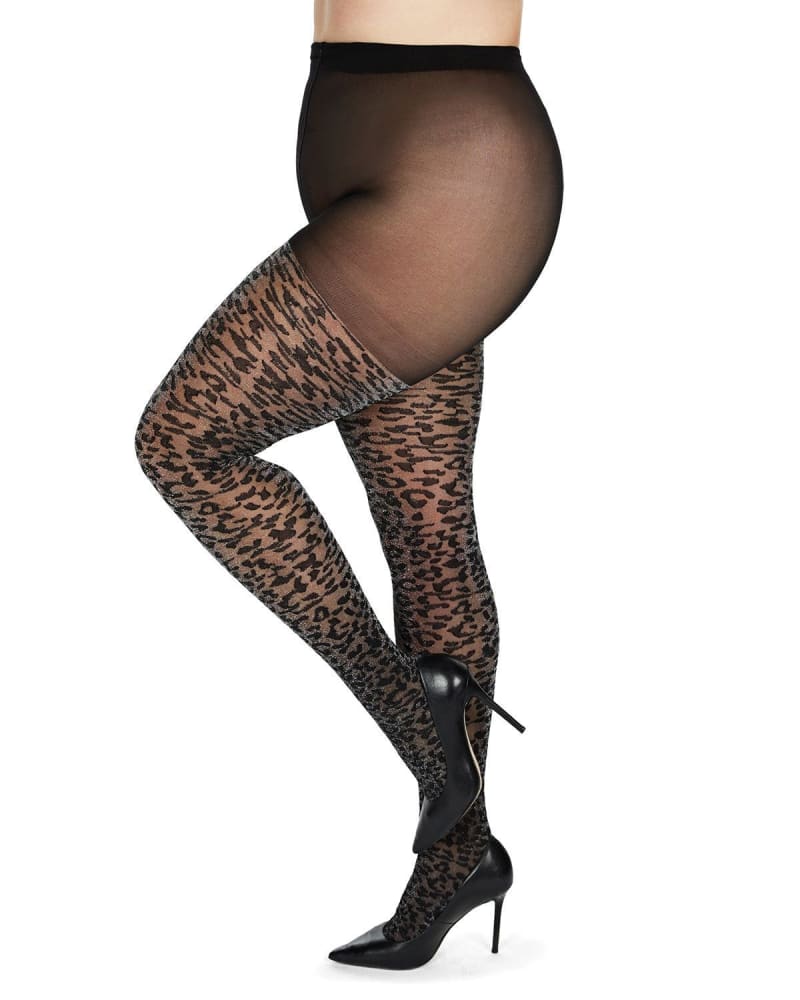 Side of a model wearing a size L-XL Leopard Print Shimmer Sheer Tights in Black by Memoi. | dia_product_style_image_id:300183